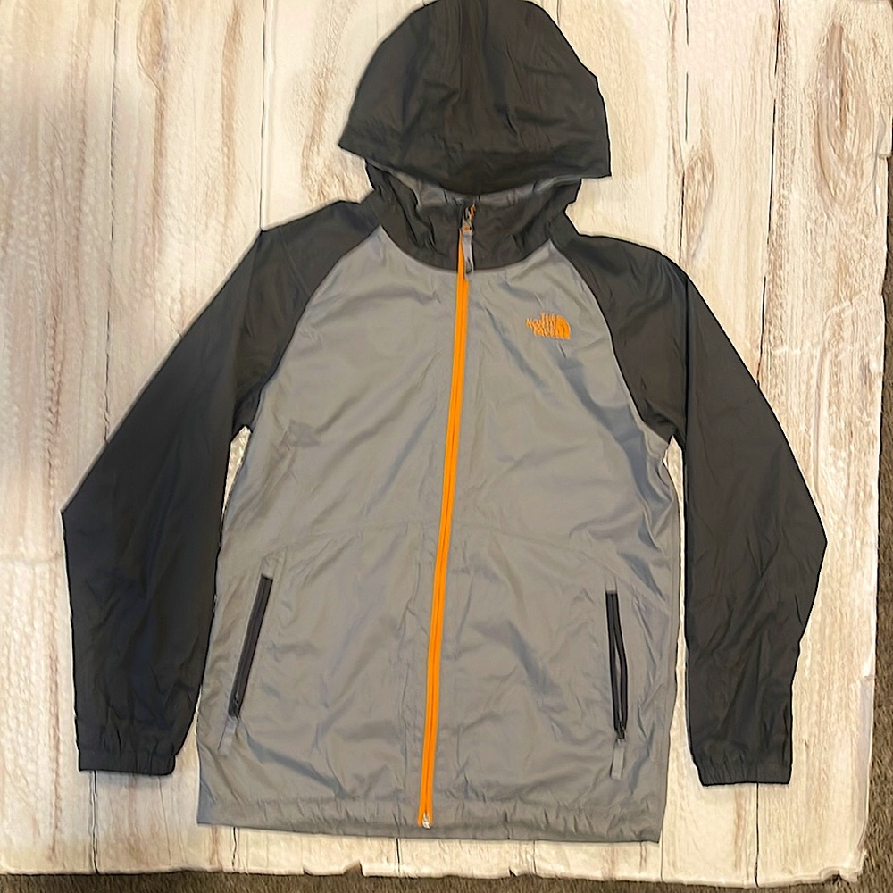 Boys North Face windbreaker/raincoat.Large 14/16. Dk.grey, Lt. grey and orange.